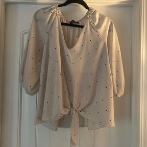 White, polka dot top